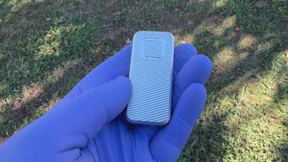 Gray RiveryMFG Zero-6061 Aluminum with lanyard hole utility knife with file pattern.