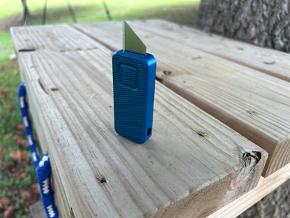 RiveryMFG Zero BLEM Blue CadLab collaboration utility knife with file pattern