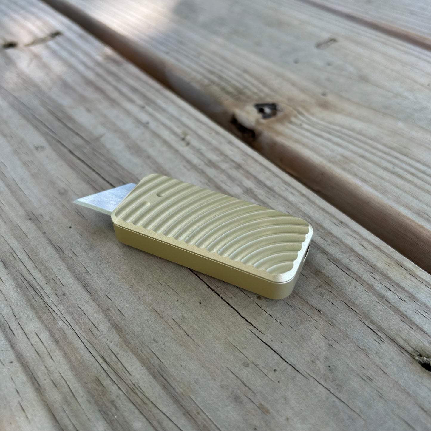 RiveryMFG Zero BLEM Gold CadLab collaboration utility knife with original pattern