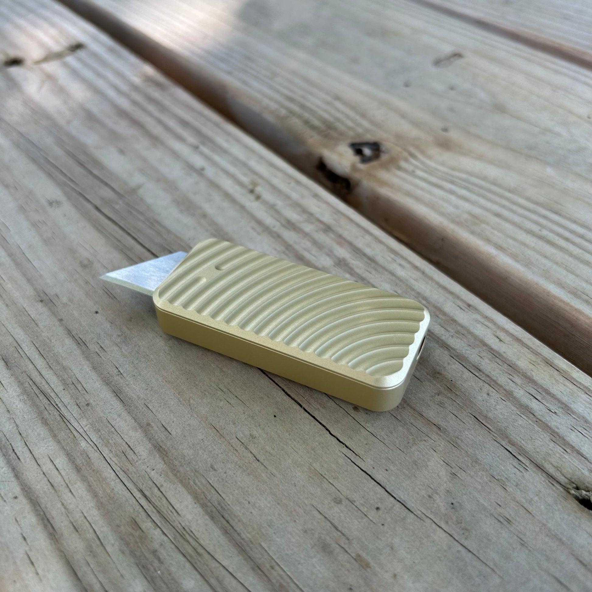 RiveryMFG Zero BLEM Gold CadLab collaboration utility knife with original pattern