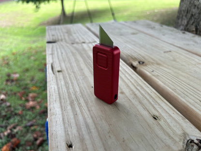 RiveryMFG Zero BLEM Red CadLab collaboration utility knife with file pattern