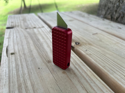 RiveryMFG Zero BLEM Red CadLab collaboration utility knife with grenade pattern