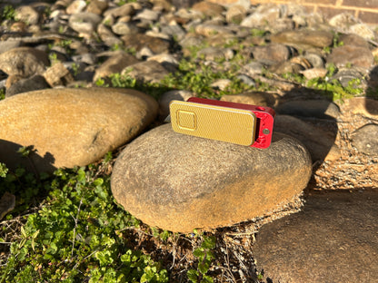 RiveryMFG Zero custom combination utility knife with file gold lid and red base.