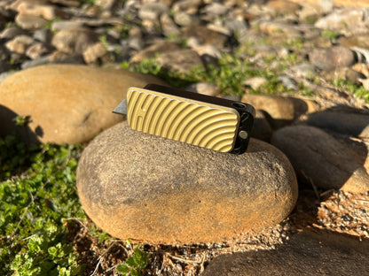 RiveryMFG Zero custom combination utility knife with original gold lid and black base.