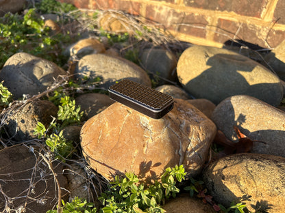 Black RiveryMFG Zero Grenade Pattern-6061 Aluminum utility knife.