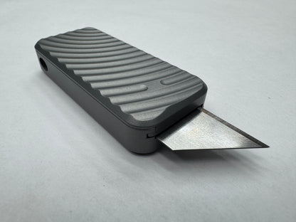 Gun Metal Gray RiveryMFG Zero utility knife with custom CadLab color and original pattern