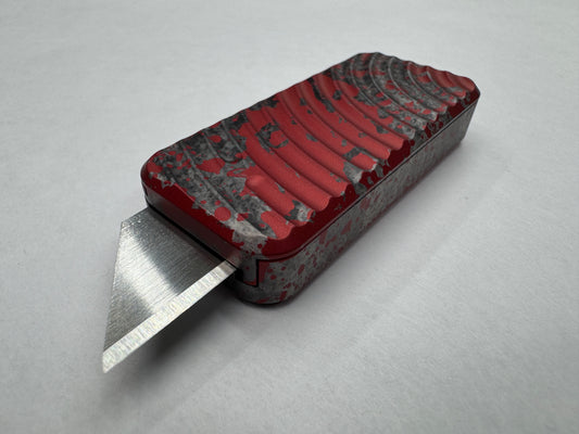 Multicolor RiveryMFG Zero utility knife with custom CadLab color and original pattern