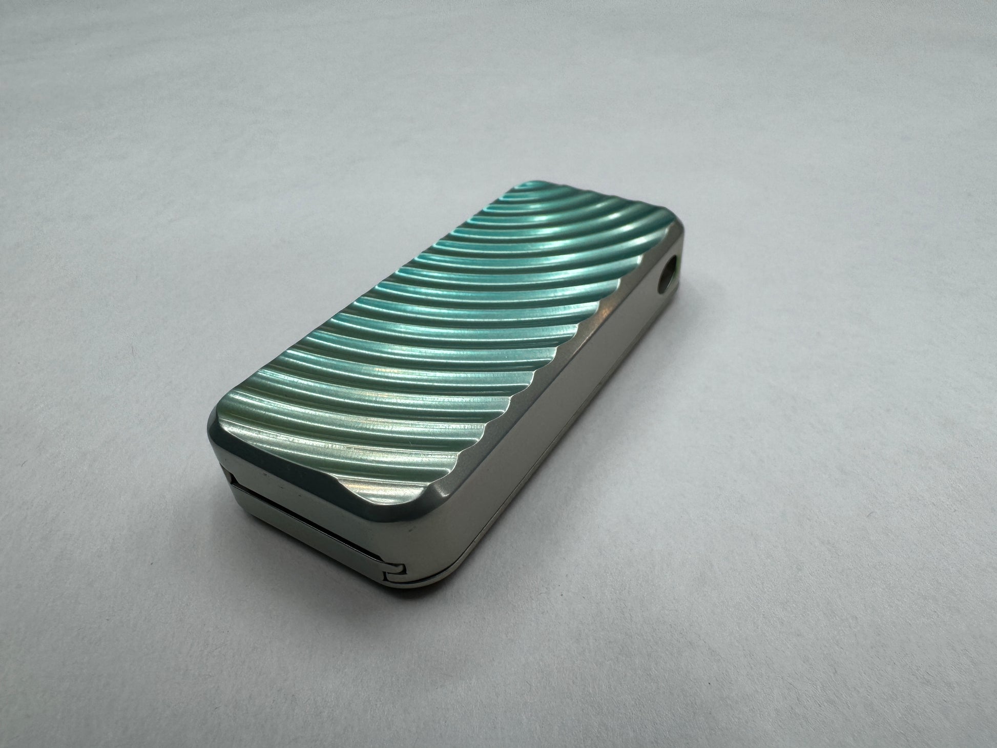 RiveryMFG Zero Pearl-1 fidget utility knife with custom CadLab color.